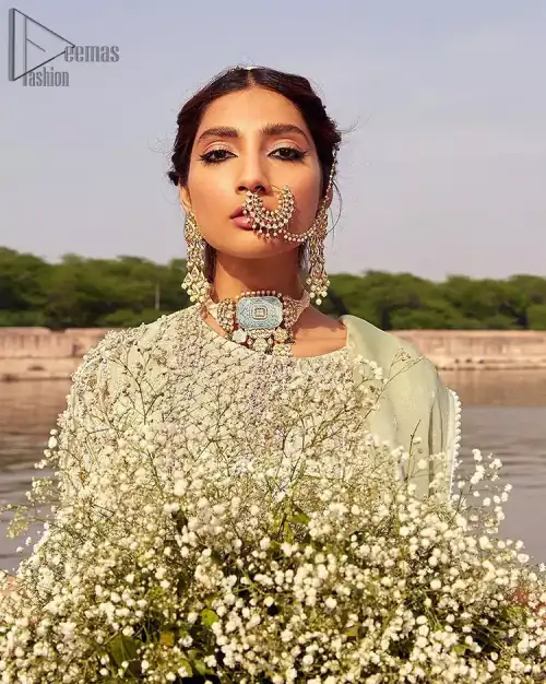 Glow up an evening formal event with a Light Parrot Green Gharara Shirt, a beautiful three-quartered sleeves shirt designed with