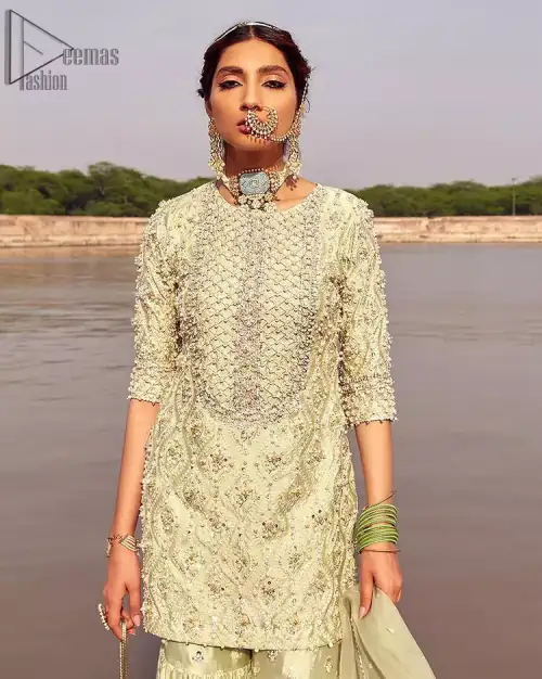Glow up an evening formal event with a Light Parrot Green Gharara Shirt, a beautiful three-quartered sleeves shirt designed with