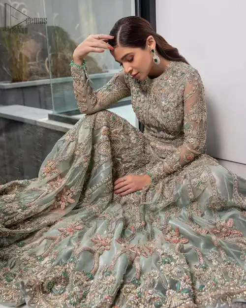 Pastel Green Large Flared Anarkali - Pakistani Wedding Gown. The bottom part of this amazing outfit comprises a lehenga with