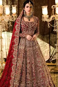 Come up with something fab on your wedding day, with a meritorious Red Lehenga Blouse. A full-sleeved attire made with pure organza follows a beautiful light golden embroidery under a stylish sweetheart neckline. This mesmerizing dress would fulfil your expectations on your reception day.