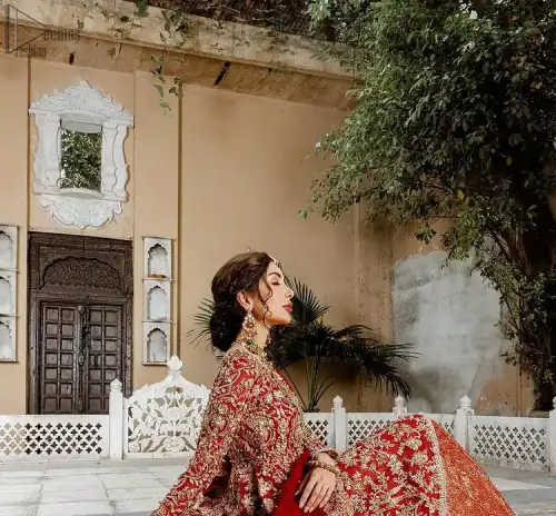 Red Bridal Peplum n Dupatta – Orange Lehenga. Red peplum with pure organza and fully engraved multi colour embroidery is