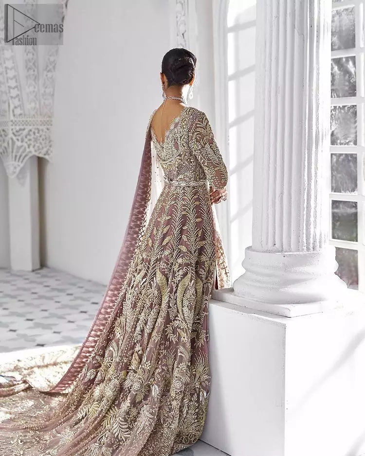 Every bride is the queen of her big day, which is why she deserves an imperial look. The Tea Pink Front Open Maxi Dupatta serves the most queenly gorgeousness with its royal full sleeves and a ravishing front open. But it's not all so simple, a complex and skilful work of silver and light golden embroidery, under its stunning V-neckline, adds more to its worth. The very meritorious back train and its exquisite dupatta with criss-cross patterns mark this exceptional attire as an embodiment of true royalty. Gracefulness along with extreme beauty is what we are looking for, hence, the dress is made with fine organza making the dress fully ready to gratify your imaginations on your Nikkah or Walima.