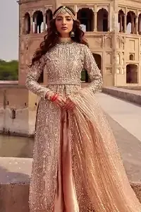the dress with a tissue dupatta and graceful palazzo pants makes you the center of attention on your big day. Peach Front Open Gown Palazzo Pants – Dupatta.