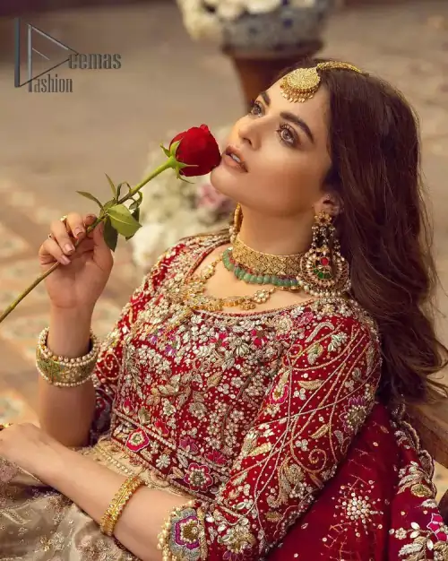 It's distinctive how the new-gen brides are welcoming red and beige shades for their bridal outfits as well. So Welcome