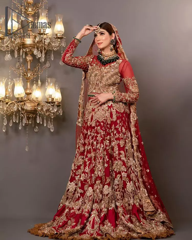Take your style up a few notches with this bold yet elegant piece on your Big day. This red full sleeves habitual blouse choli is remarkably made with pure organza, styled easily and graciously with boat shape neckline and fully embellished with tilla, kora , dabka work. In addition to this, the frilled lehenga is also fully embellished with heavy embroidery that perfectly enhance your dazzling style on your big day. Finish this look with a red dupatta that have sequins spray all around and embellished with a four-sided scalloped border as well.