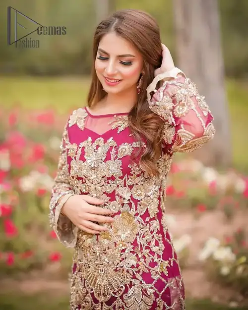 Take a step towards refreshing your wardrobe with a Shocking pink long Shirt. This dress is allured with floral embroidery.