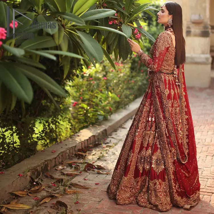 We're sure that all girls love slipping into "maroon outfits for weddings" So, we create this maroon article that will capture your moments on your big day. All details of the blouse are just amazing as it is adorned with golden tilla, kora, dabka embroidery. Just look closely at the boat shape neckline of the blouse that gives super-duper look when combine with full-length sleeves. Furthermore, it is coordinated with can can lehenga just to boost up your day by giving dreamy look. Conclude this maroon article with a chiffon dupatta that has four-sided embellished lace to capture your moments.