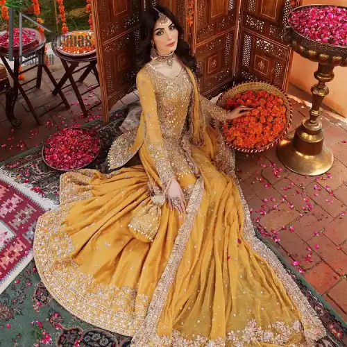 The shirt is the mirror of the mind and the dupatta confesses secrets of the heart. This mustard soft-toned article
