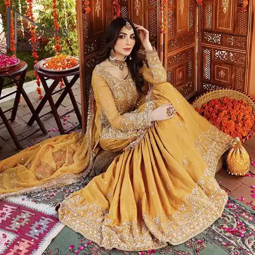 The shirt is the mirror of the mind and the dupatta confesses secrets of the heart. This mustard soft-toned article