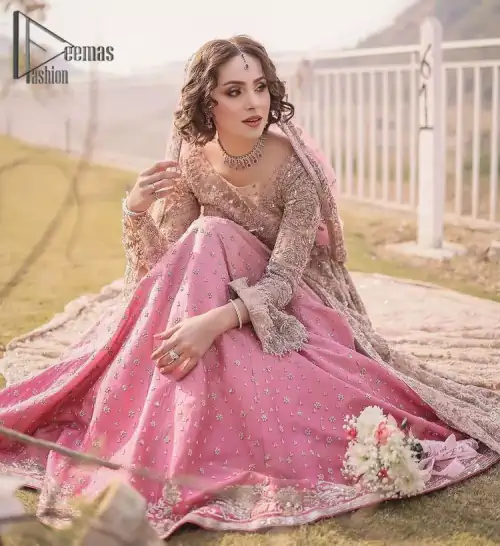 There is nothing more magical than wearing pink colour on your Walima. Our pink side slit open maxi is handsomely