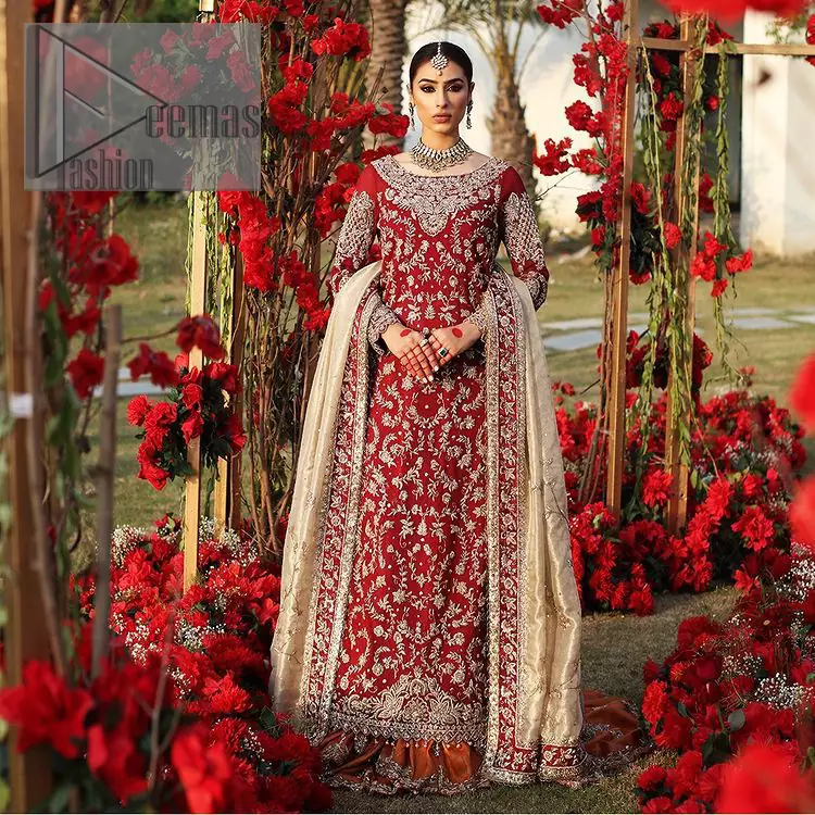She's headstrong and rebellious, determined to divert the pacts of tradition on her Big day. Presenting a Red long shirt of DeemasFashion which is attractively ornamented with silver embroidery which involves kora, dabka, and zardozi work. It is especially highlighted with full sleeves which enhance the charmless of the article when combine with boat shape neckline. Pair up with an orange back train lehenga which is made up of pure jamawar that gives a super aesthetic and traditional look to every bride. End up this lovely look with a light golden dupatta which is embellished with a four-sided border just to fulfil the traditional gentle look. 