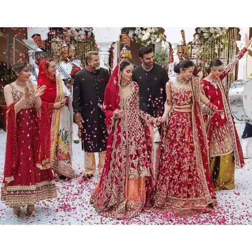 The majestic red signs a melody just for you. The handsome scalloped frock is made in the richest shade of