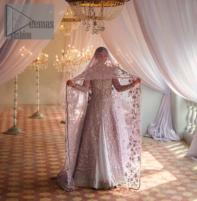 Bold instruments on a bright canvas make a true fashion statement. Introducing a lilac outfit for your Walima day to boost up your day. The front open gown in lilac colour looks as amazing as any bride's dream. It is encapsulated with silver embroidery which contains crystal, tilla, dabka, kora and sequins spray all over. In addition to this, it is highlighted with a sweetheart neckline to enhance the beauty of the gown when combined with full sleeves. It is systemized with silver barcode sharara finished with silver border embroidery that enhances the look of the bride during the day as well as night events. Complete this lilac article with a dupatta which is ornamented with four-sided borders and sequins sprayed all over. 