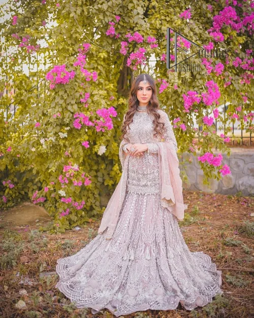 Introducing the mauve nikah outfit which begins with a short shirt that is meticulously and laboriously hand-rendered with silver embroidery