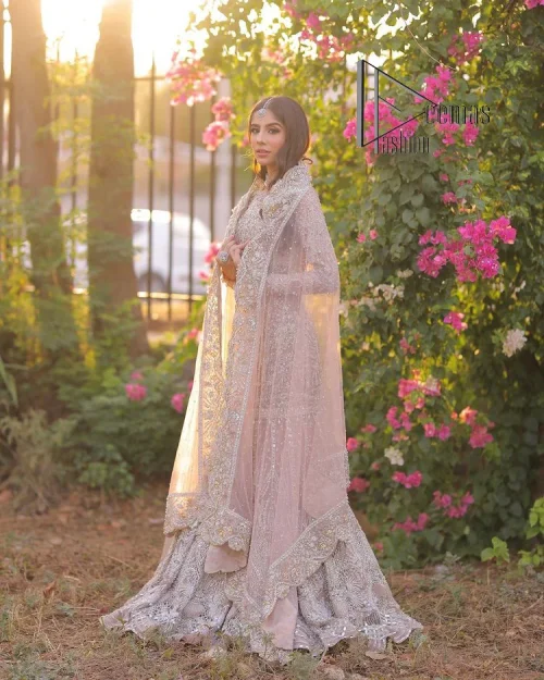 Introducing the mauve nikah outfit which begins with a short shirt that is meticulously and laboriously hand-rendered with silver embroidery