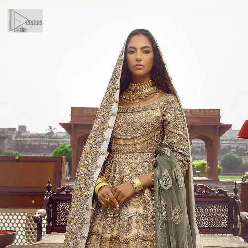 Capturing the essence of modernity on your Nikah with this ivory article. DeemasFashion presents this frock which is intricate with