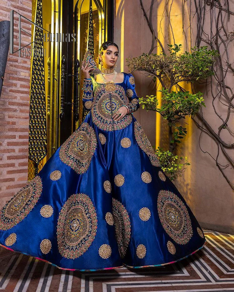 Embodying grace with iridescent glamour. This royal blue party outfit from DeemasFashion will turn heads. It is appealing with multiple colour embroidery all over which is further enhanced with tilla, dabka, kora and the real magic of zardozi. The square neckline of the fit and flare maxi will give life to your whole attire at any party. Further, the following maxi has full sleeves which are ornamented with handsome details of hand embroidery. The floral motifs also make the attire magnificent and more glorious which hits all the right hearts.