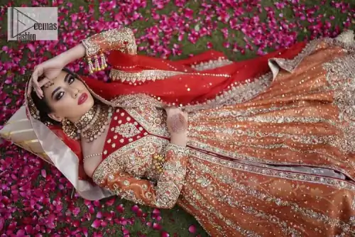 Shine bright in the sparkling ensemble from DeemasFashion. Introducing this reception outfit which begins with a rust pishwas. This front