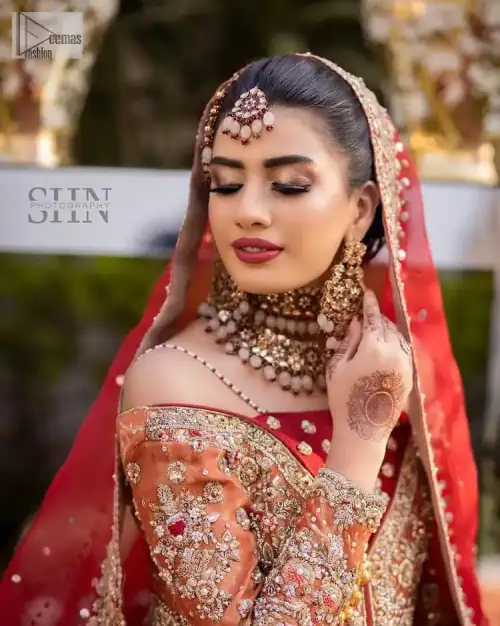 Shine bright in the sparkling ensemble from DeemasFashion. Introducing this reception outfit which begins with a rust pishwas. This front