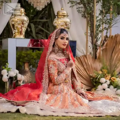 Shine bright in the sparkling ensemble from DeemasFashion. Introducing this reception outfit which begins with a rust pishwas. This front