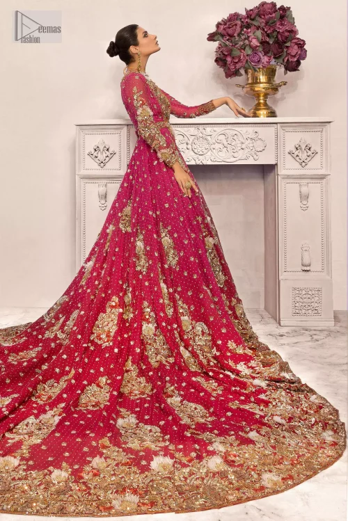 A maxi in a beautiful shade of shocking pink is deftly adorned with glowing tilla, dabka and pearls making this
