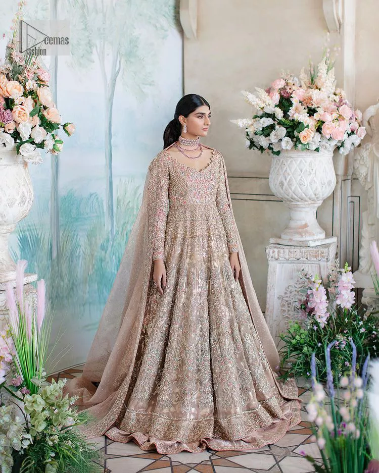 Make your Nikah look pop with the unique pieces from DeemasFashion. This pishwas is hand-embellished with multiple colour embroidery and lavish designs. Pearls, tilla, dabka, kora, zardozi and sequins give a glamorous touch to this Pishwas. The V neckline of the following pishwas archives a finished look. Further, the full sleeves balance the look of the outfit to make your day charming and beautiful. It is coordinated with floor length lehenga and is also embellished to make this stunning attire a breathtaking choice to wear on the most important day of your life. Finish this with a dupatta framed with four-sided borders and sequins sprayed all over.