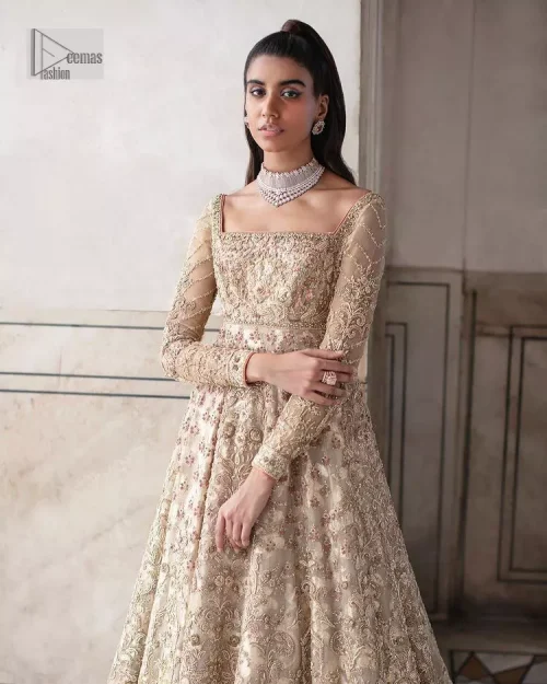 Ooze beauty and elegance in this simple yet amazing ensemble. This walima outfit in the off-white colour is a magnificent