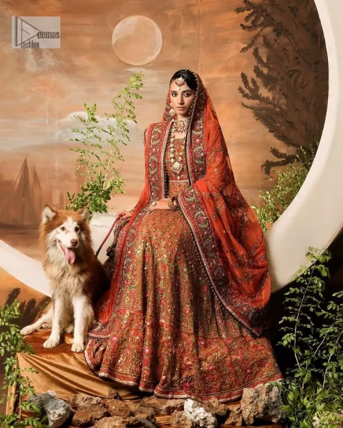 Blissful rust! This ensemble is the epitome of grace. DeemasFashion presents this beautiful mehndi outfit in rust colour to make