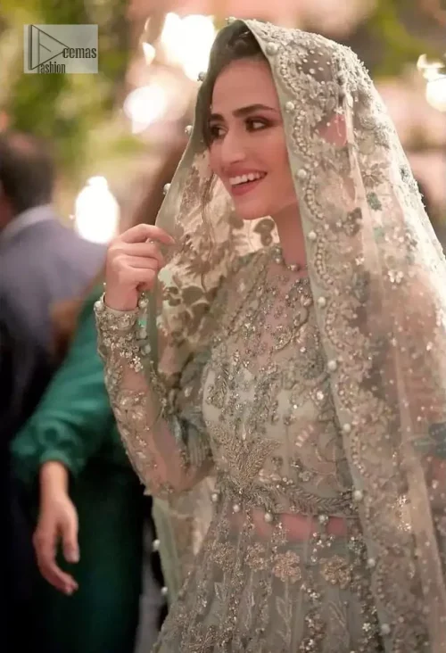 The magic reflects in every piece of this nikah wear. DeemasFashion presents a stunning outfit in an aqua-blue colour. A