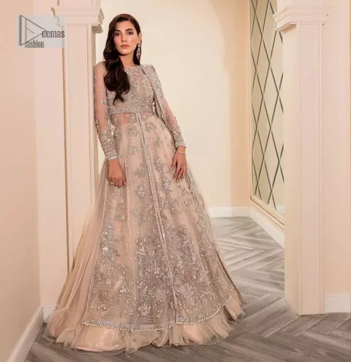 Get ready to lost in the world with floral and trendy designs. This dress is beautifully decorated with heavy embroidery.