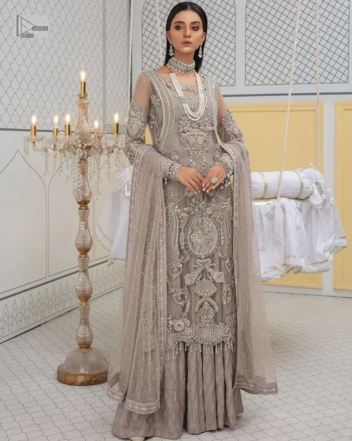 Chill vibes in grey are very rare. A beautiful grey shirt with a medley of hand-embellished floral motifs and floral