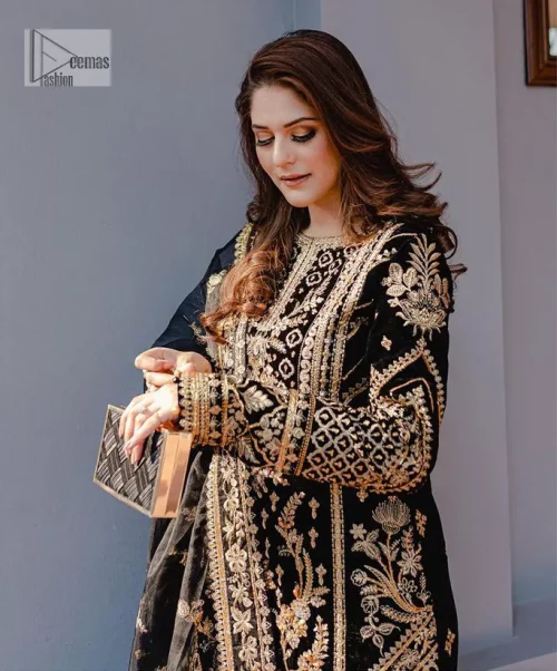 Intricate floral patterns all over! Make a style statement with this elegant embroidered long shirt adorned with golden embroidery decorated with