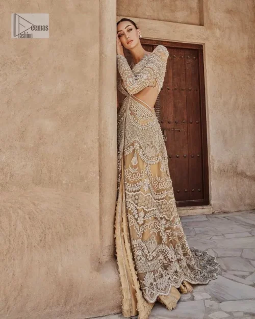 Bold, edgy, and wrapped in glamour. A sumptuous palette of gold with silver delicate embroidery, signature handcrafted embellishment includes tilla,