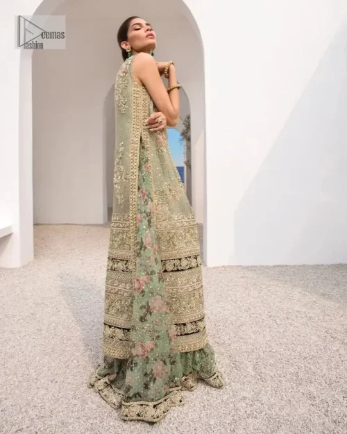 The timelessly classic mint green nikah outfit! The beautiful model looks ravishing in this mint green shirt, heavily hand-embellished with