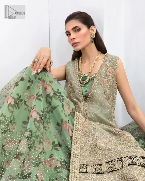 The timelessly classic mint green nikah outfit! The beautiful model looks ravishing in this mint green shirt, heavily hand-embellished with