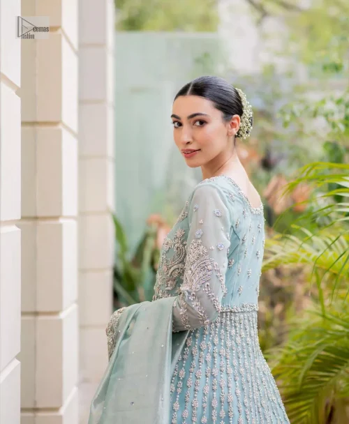 The fused lehenga is offered in a rich, sophisticated colour palette, ensuring you steal the spotlight with your regal presence.