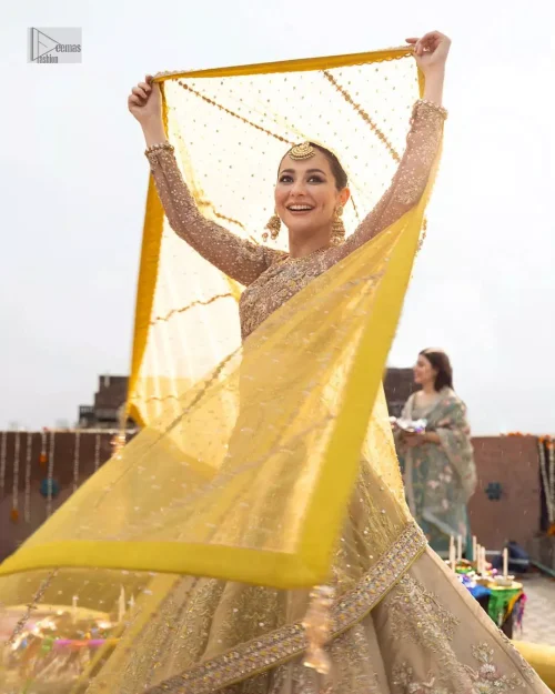 The blouse is crafted with multiple color embroidery which involves tilla, dabka, kora, Kundan, and Zardozi, this ensemble features lively