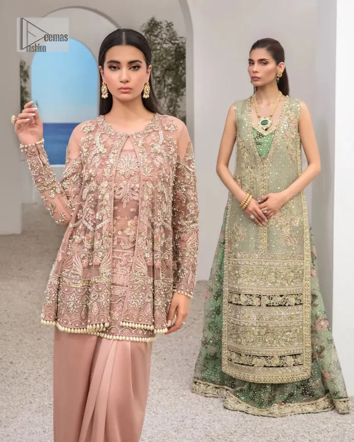 Rich shades and stunning details of party outfit – you’ll be making heads turn. A 2 pc outfit with a short front open shirt, full sleeves with floral pattern and embellishments on organza fabric; the asymmetrically placed designs are studded with golden and silver embroidery which is further highlighted with tilla, dabka, kora, Kundan and the intricate details of Zardozi. The embellished neckline has the finest details. It is paired up with the inner shirt that is also embellished to make this luxury attire unique. To complete the outfit the plain lehenga paired, just to fulfil your diva look.