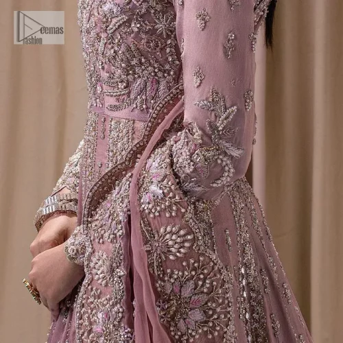 Stand out and stay pink with this nikah wear! The delightful article in pink colour is a traditional masterpiece that