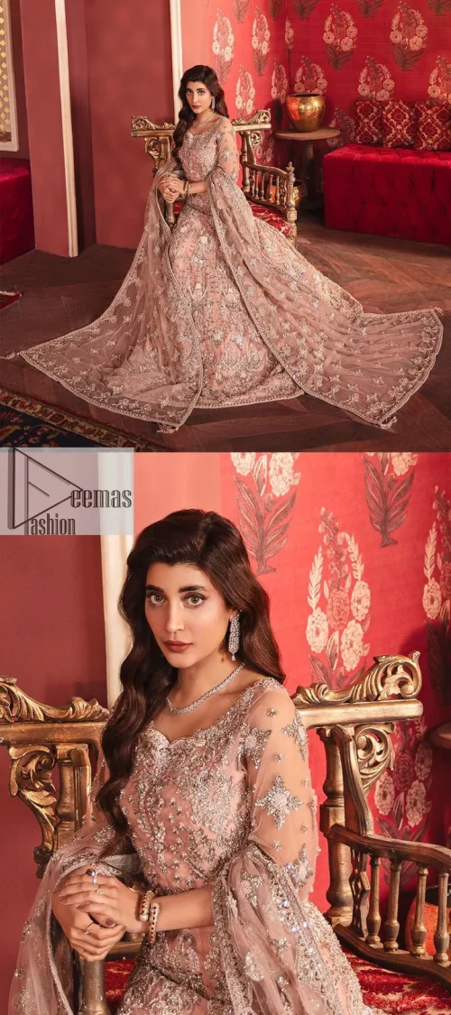 The beautiful outfit comes has an alluring peach colour and is gracefully emblazoned with embroidery. Hand-crafted details of tilla, dabka,