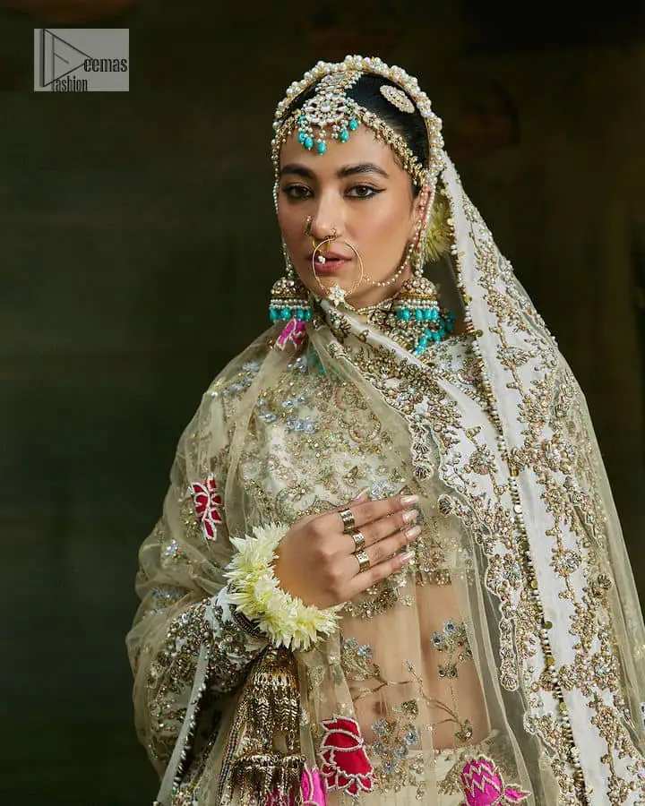 Carefully crafted design offers a comfortable and flattering fit having multiple colour embroidery which involves tilla, dabka, kora, Kundan and