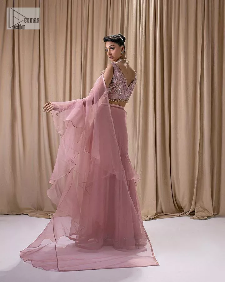 tea pink colour dress MASURI Tea-pink coloured frock which carries the true essence of glamour and timeless class.A traditional outfit with a modernist twist. Hand embellishments and embroidery creates a quintessential statement
