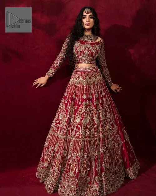 The following blouse is beautifully decorated with golden embroidery and enhanced with tilla, dabka, kora, Kundan, and the real magic