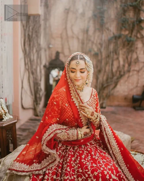 Step into your reception with confidence and poise in our exceptional red reception outfit, a true embodiment of individuality. This