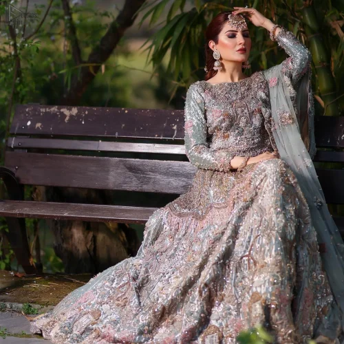 This stunning ensemble features a refreshing mint hue embellished with minutely detailed multiple-colour thread embroidery that brings the outfit to