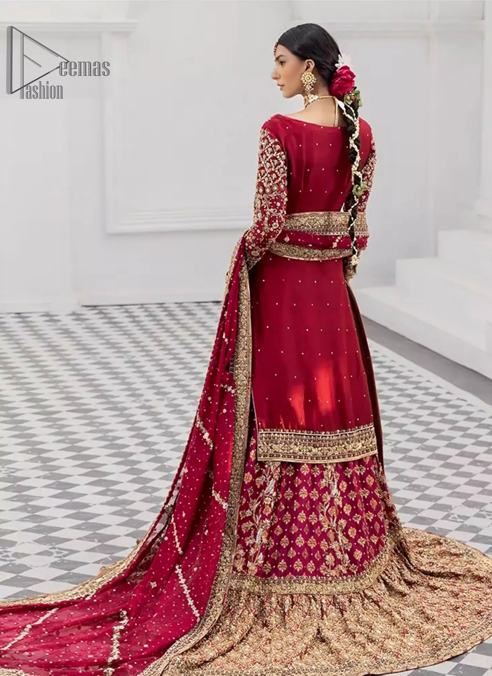 Step into the hall, captivate every eye and let the audience make room for the beauty in red. This attire ensures your glamour is unmatchable on your big day!