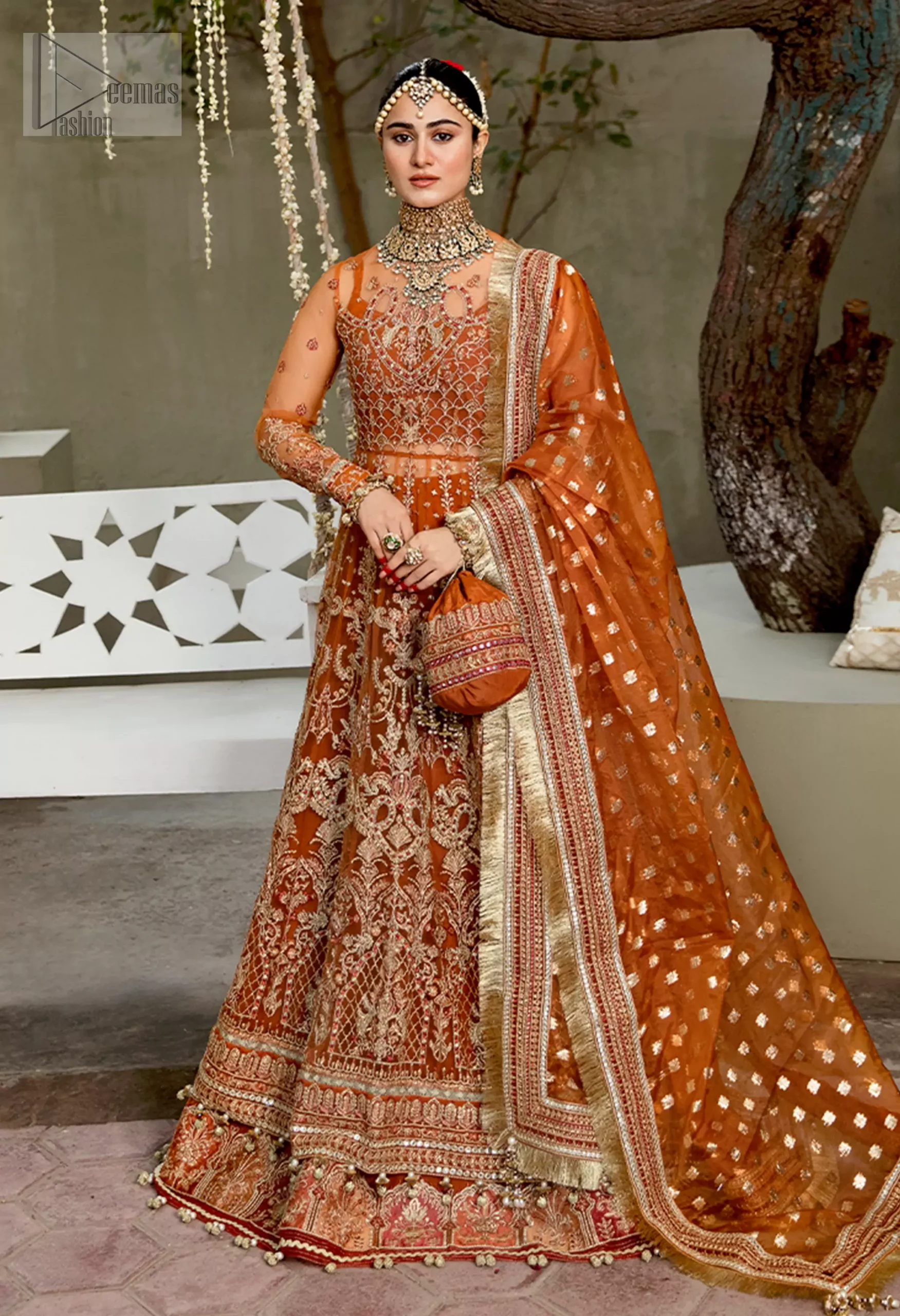 Crafted from airy organza, this dress is an ode to timeless beauty, making you the epitome of grace and joy on your special night.