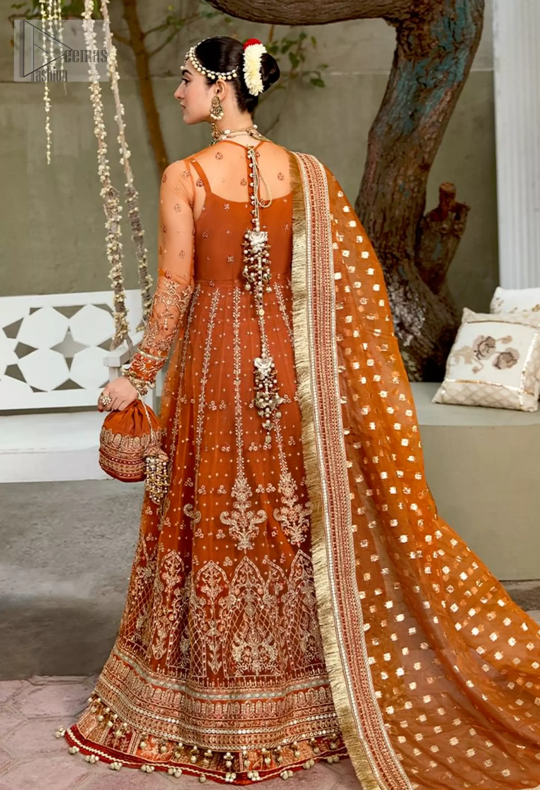 The can-can layers create a voluminous, dramatic silhouette that flows gracefully with every move. A hint of modern allure comes from the illusion neckline, paired with classic full sleeves.