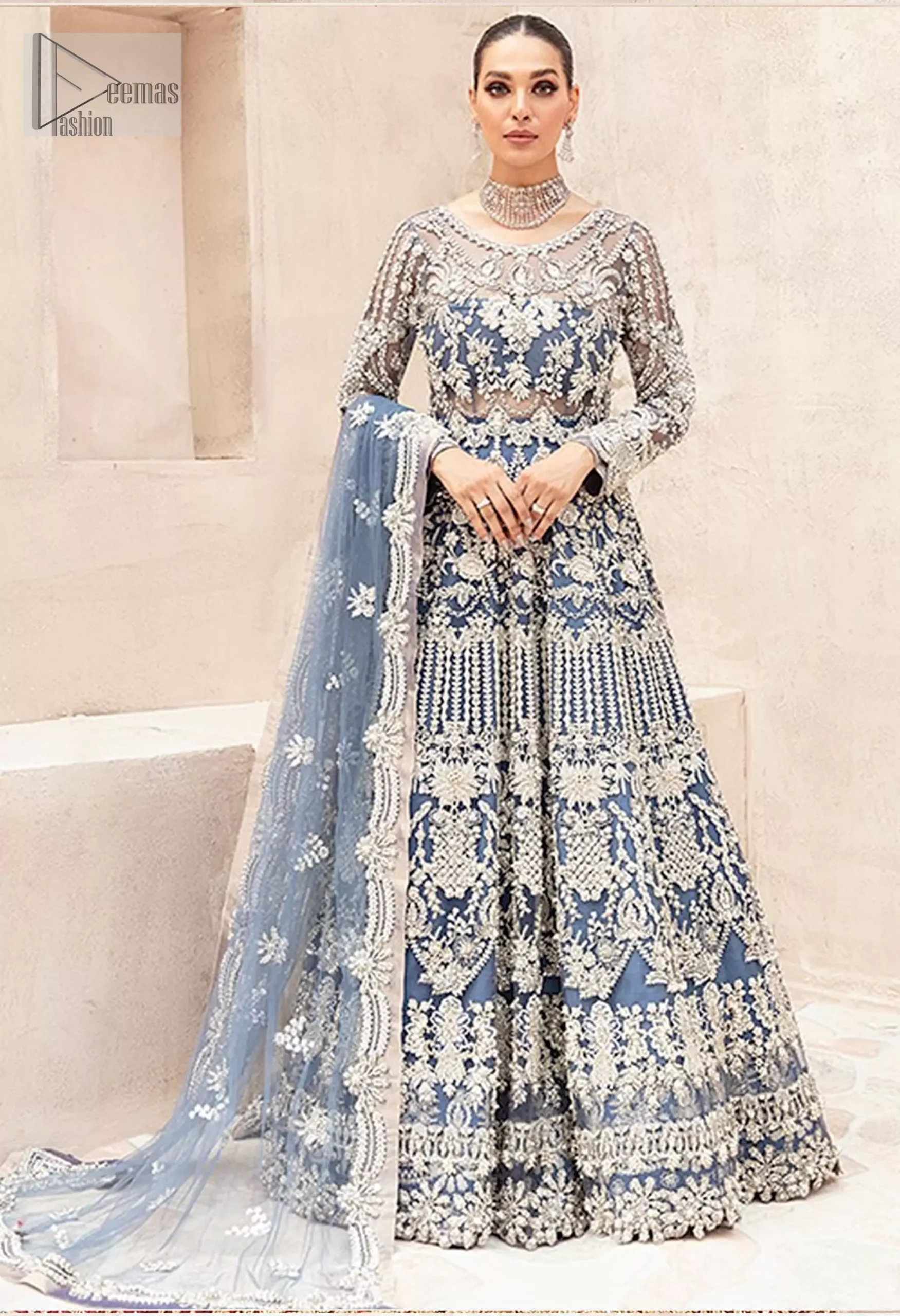 Crafted from flowing organza, this ensemble captures the essence of timeless beauty, making it the perfect choice for a bride who wants to radiate elegance with every step.