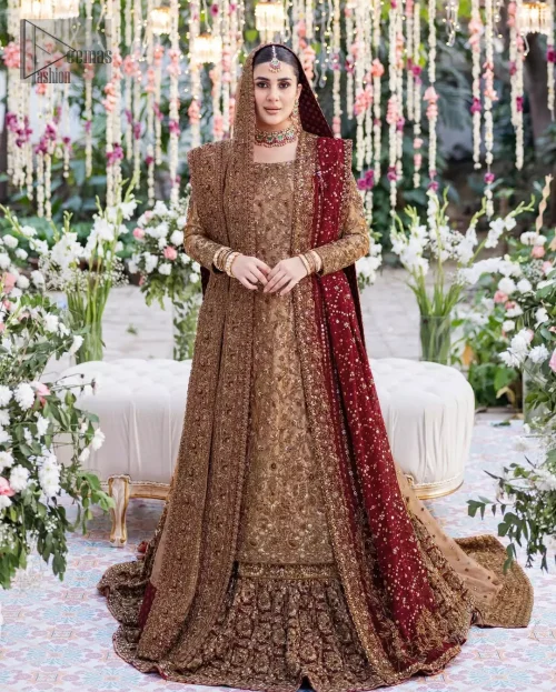 The shirt is made from pure tissue, which gives it a soft metallic finish that works well with antique embroidery